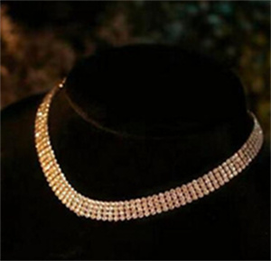 Gold-tone appearance choker on a black neck display